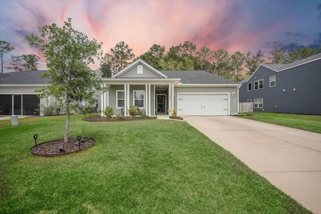 221 Lucca Dr, Summerville, SC 29486 - view of front of home with concrete driveway, a front yard, and a garage