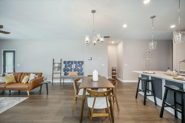 221 Lucca Dr, Summerville, SC 29486 - dining space featuring recessed lighting, visible vents, baseboards, dark wood-style flooring, and ceiling fan with notable chandelier