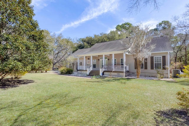 view of front of property featuring crawl space, central AC unit, covered porch, and a front yard