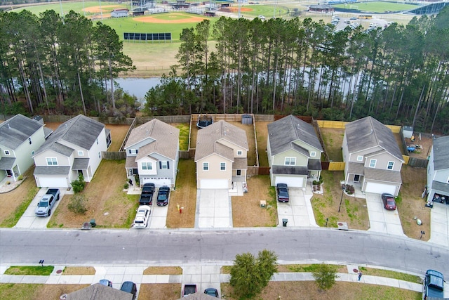 aerial view with a water view and a residential view