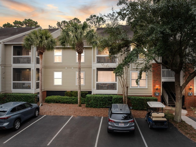 view of outdoor building at dusk