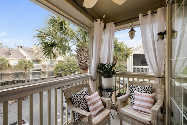 balcony featuring ceiling fan