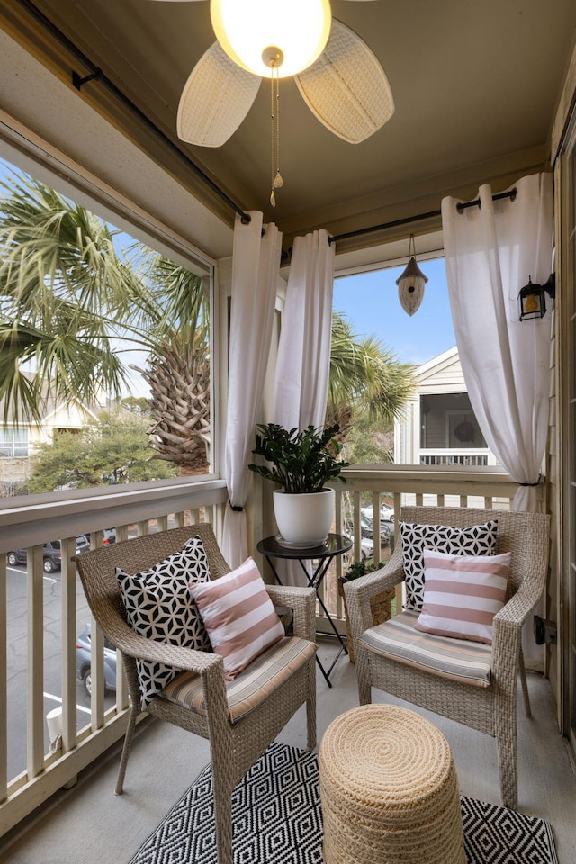 balcony featuring ceiling fan