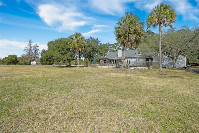 view of yard featuring fence