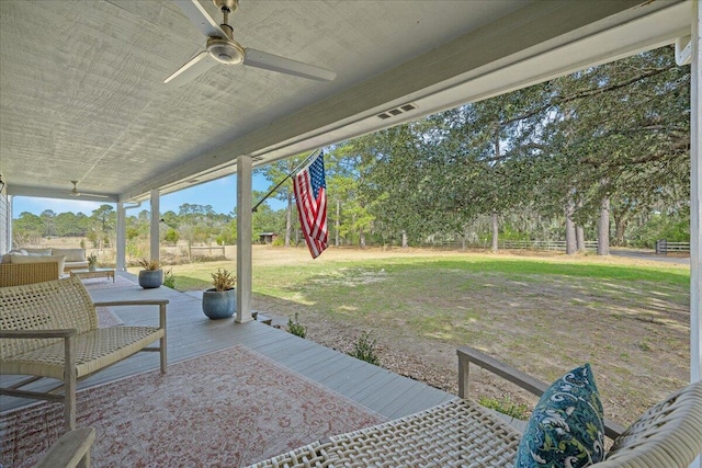 view of patio featuring a ceiling fan