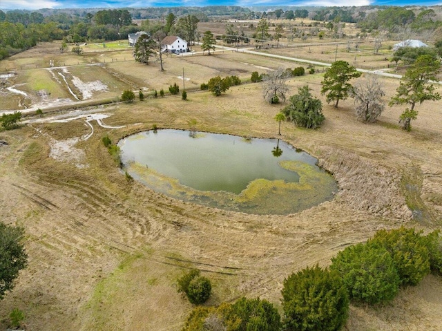 aerial view featuring a rural view and a water view