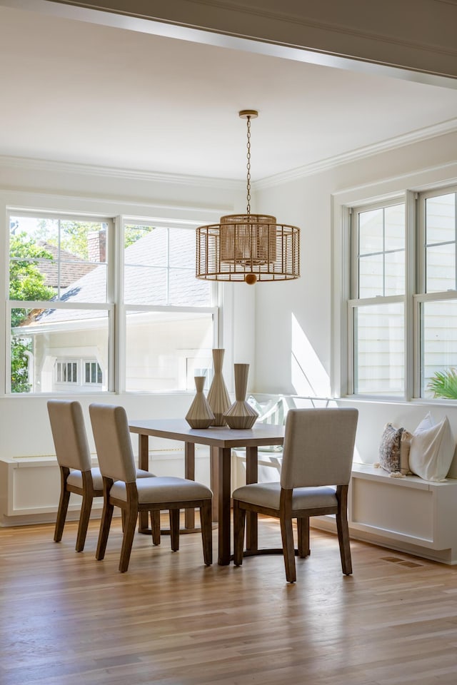 517 Royall Ave, Mount Pleasant, SC 29464 - dining room featuring ornamental molding, plenty of natural light, and light wood-type flooring