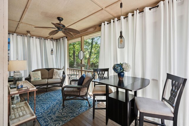 sunroom / solarium with wood finished floors