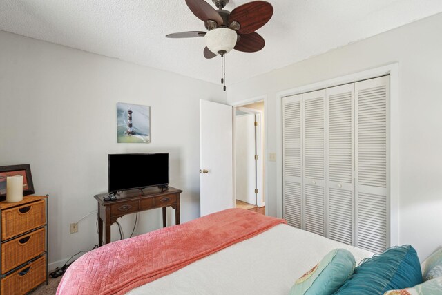 bedroom with a closet and ceiling fan
