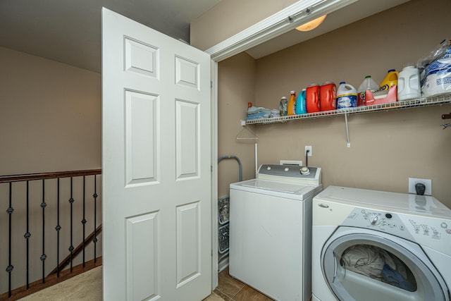 laundry room with washer and dryer