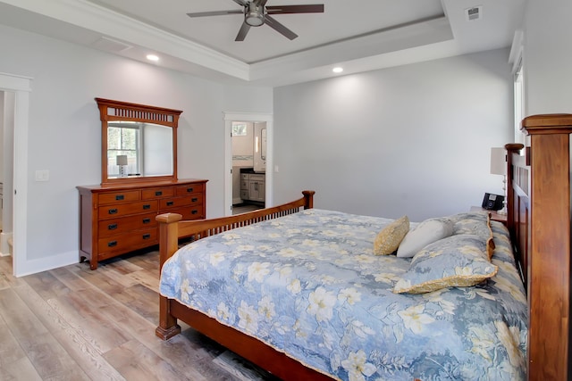 1543 Scott Hill Rd, James Island, SC 29412 - bedroom featuring a raised ceiling, light wood-style flooring, recessed lighting, ceiling fan, and baseboards