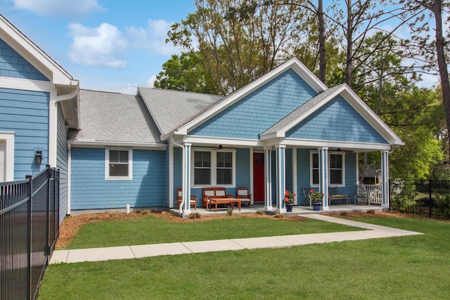 1543 Scott Hill Rd, James Island, SC 29412 - view of front facade with roof with shingles, a ceiling fan, and a porch