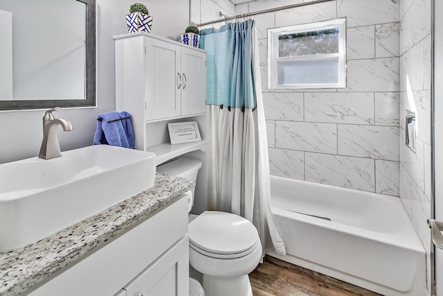 1543 Scott Hill Rd, James Island, SC 29412 - bathroom featuring vanity, toilet, shower / bath combo with shower curtain, and wood finished floors