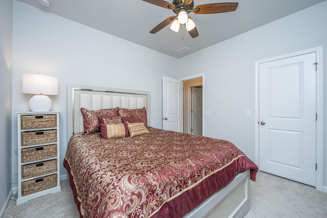 carpeted bedroom with ceiling fan