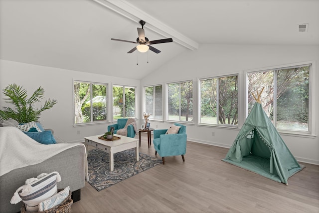 sunroom with wood finished floors and healthy amount of natural light