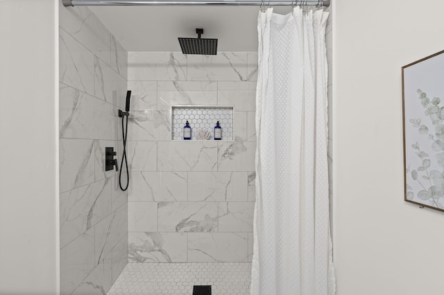 bathroom with a stall shower
