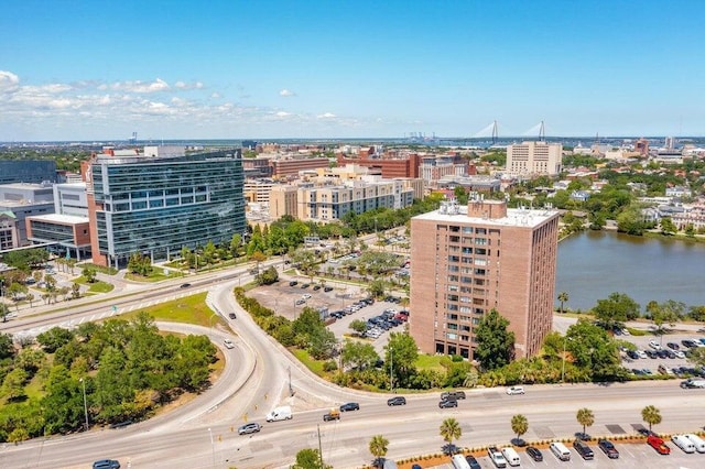 bird's eye view featuring a water view and a view of city