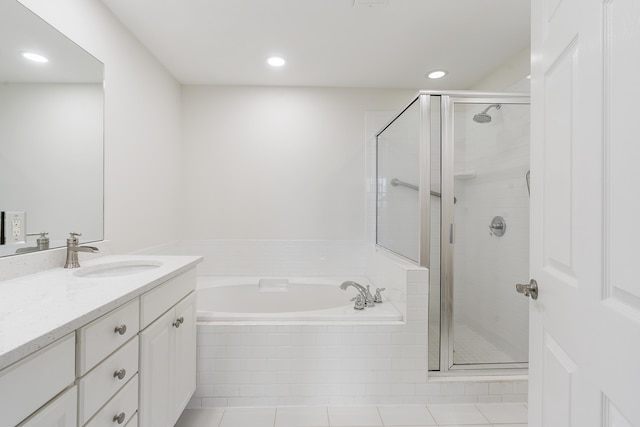 full bathroom with a bath, recessed lighting, a shower stall, and vanity