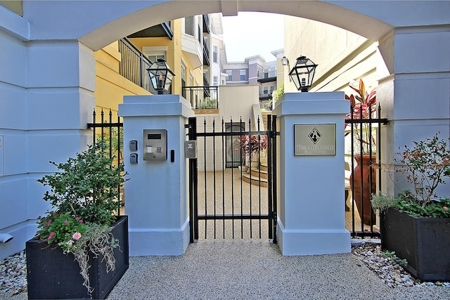 view of gate featuring a residential view