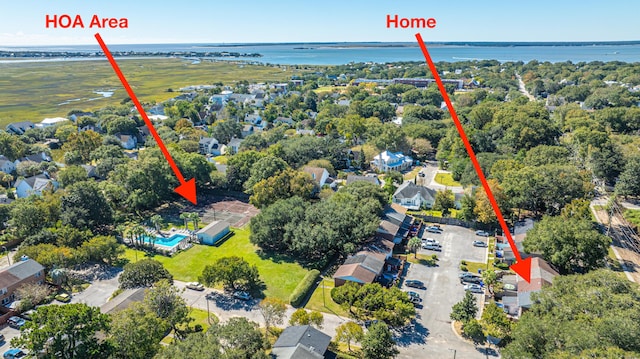 birds eye view of property featuring a water view