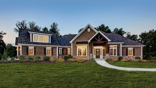 view of front of home featuring a yard