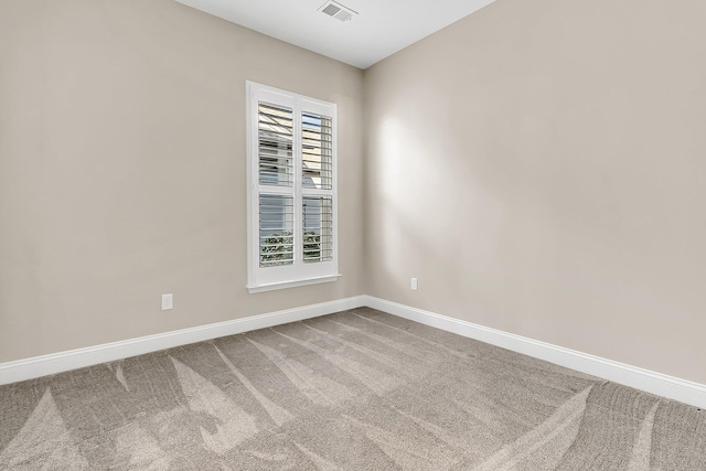 unfurnished room with carpet floors