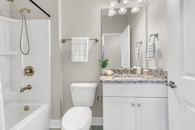 full bathroom featuring vanity, shower / washtub combination, and toilet