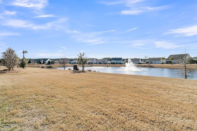 view of yard with a water view