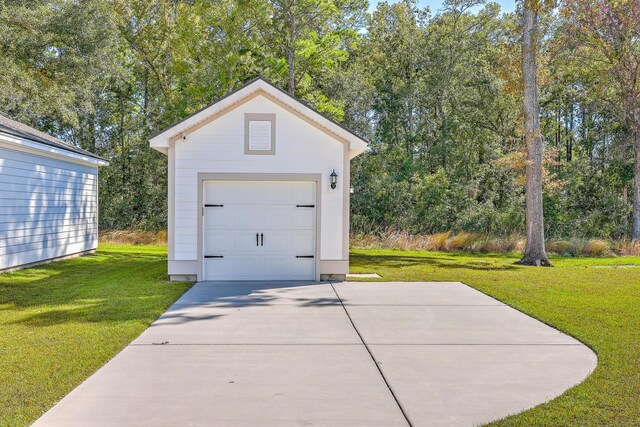 garage with a yard