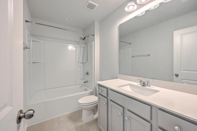 full bathroom with bathtub / shower combination, vanity, toilet, and tile patterned flooring