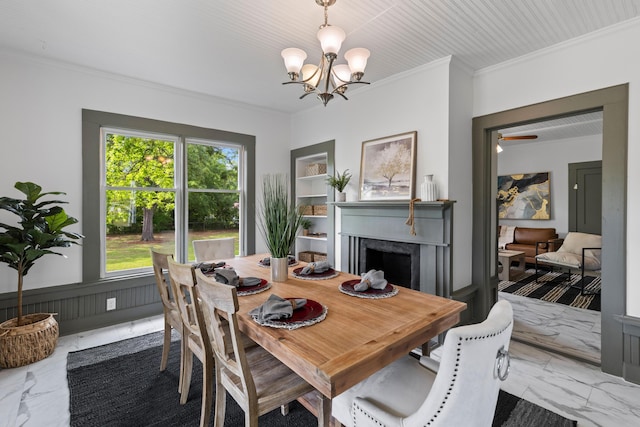 285 Roosevelt Dr, Saint Stephen, SC 29479 - dining area featuring marble finish floors, crown molding, a chandelier, and healthy amount of natural light