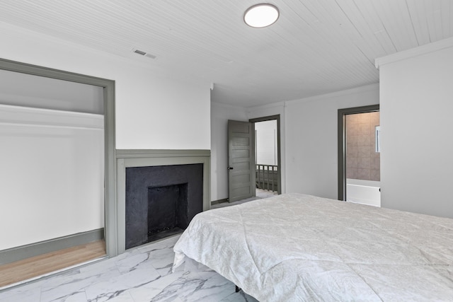 285 Roosevelt Dr, Saint Stephen, SC 29479 - bedroom with marble finish flooring, ornamental molding, and a fireplace