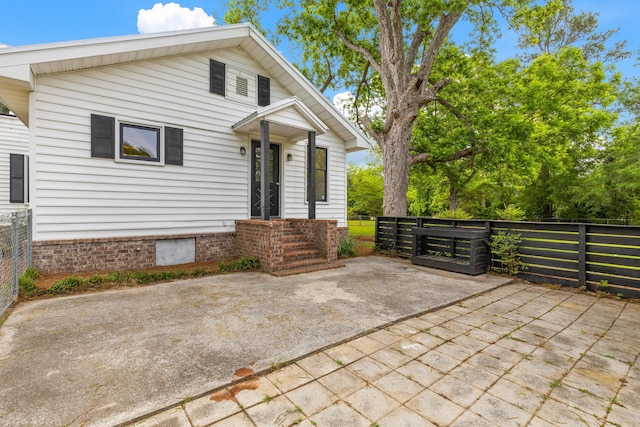 285 Roosevelt Dr, Saint Stephen, SC 29479 - view of front of home featuring fence, crawl space, and a patio