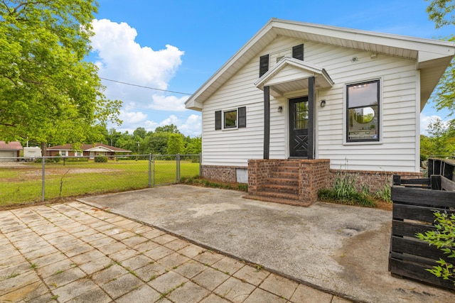 285 Roosevelt Dr, Saint Stephen, SC 29479 - view of front of home featuring fence and a gate