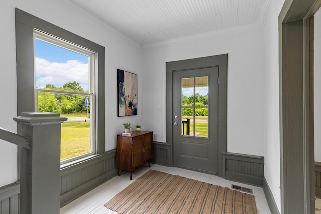 285 Roosevelt Dr, Saint Stephen, SC 29479 - doorway featuring wainscoting and ornamental molding