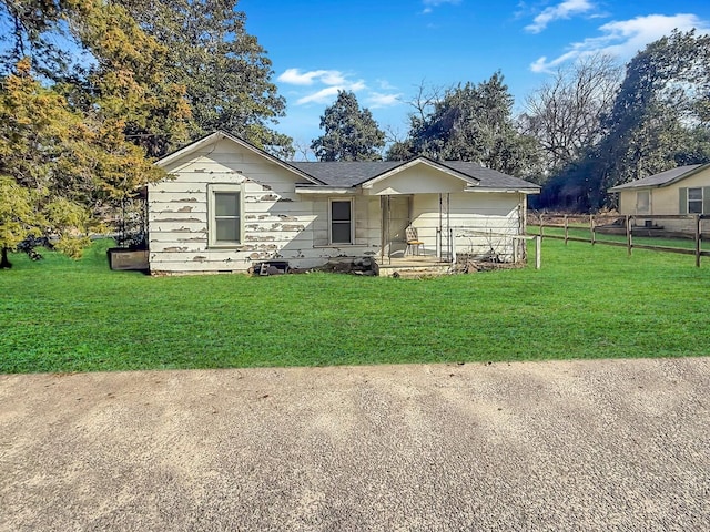 379 Sato Ave, Denmark, SC 29042 - view of front of house featuring fence and a front yard