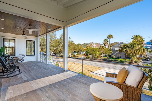 wooden terrace with ceiling fan