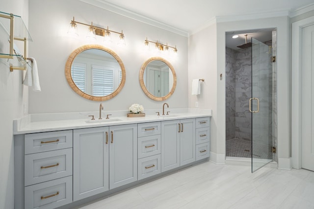 bathroom with an enclosed shower, vanity, and ornamental molding