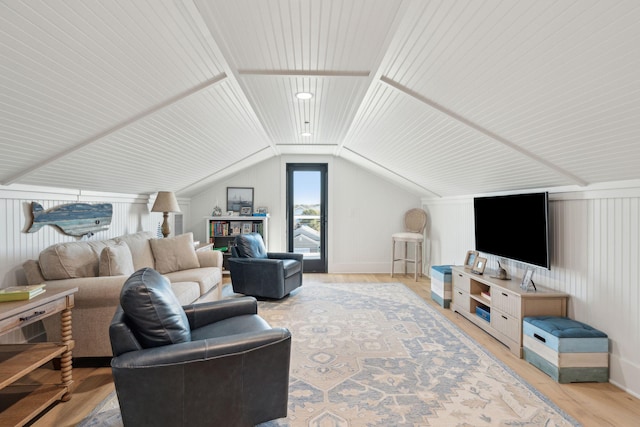 living room with light hardwood / wood-style flooring, lofted ceiling, and wood ceiling