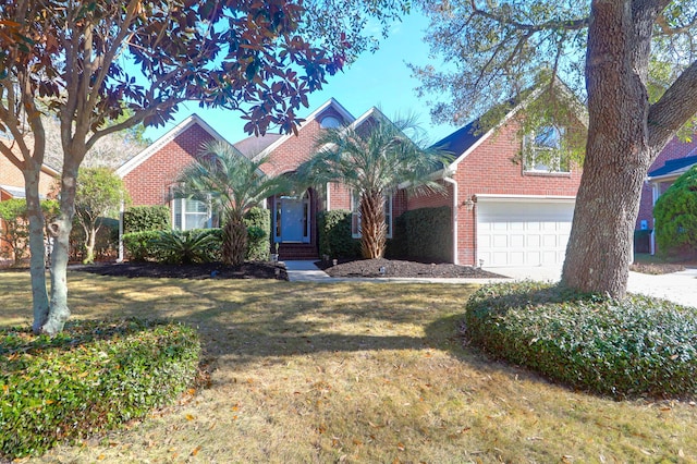2707 Waterpointe Cir, Mount Pleasant, SC 29466 - view of front of home with brick siding, a garage, a front lawn, and driveway