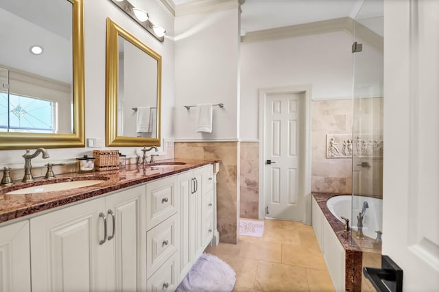 2707 Waterpointe Cir, Mount Pleasant, SC 29466 - full bath with a garden tub, double vanity, crown molding, tile patterned flooring, and tile walls