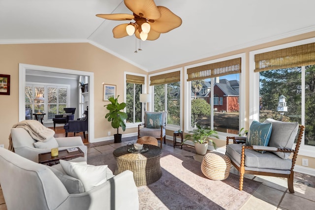 2707 Waterpointe Cir, Mount Pleasant, SC 29466 - sunroom featuring lofted ceiling, ornamental molding, tile patterned floors, and baseboards