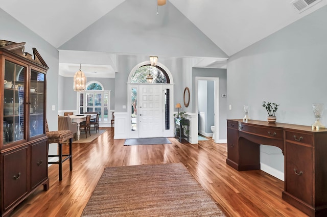 2707 Waterpointe Cir, Mount Pleasant, SC 29466 - foyer entrance with a chandelier, wood finished floors, high vaulted ceiling, and ceiling fan