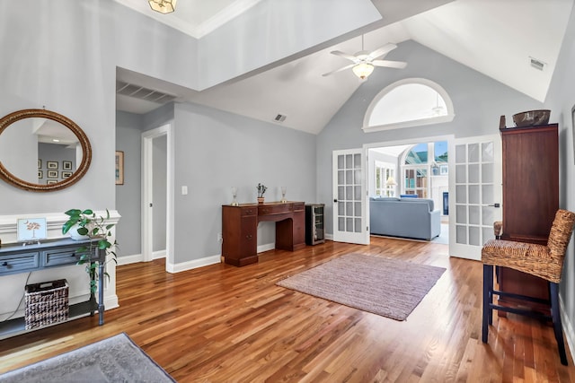 2707 Waterpointe Cir, Mount Pleasant, SC 29466 - entrance foyer with french doors, ceiling fan, high vaulted ceiling, wood finished floors, and baseboards