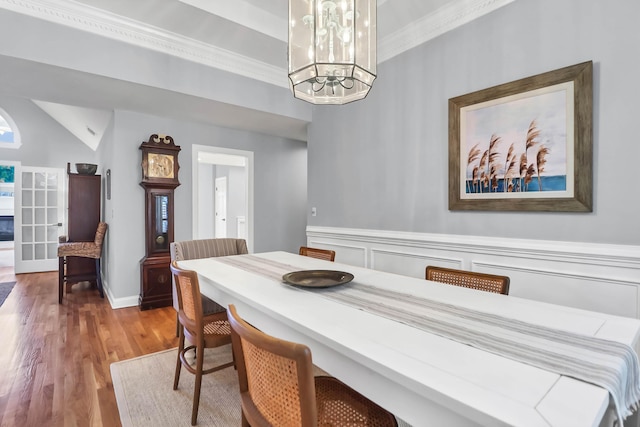 2707 Waterpointe Cir, Mount Pleasant, SC 29466 - dining space with a chandelier, wood finished floors, and ornamental molding