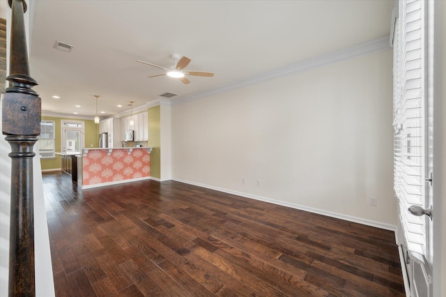 1533 Bluewater Way, Charleston, SC 29414 - unfurnished living room featuring a ceiling fan, ornamental molding, dark wood finished floors, baseboards, and recessed lighting