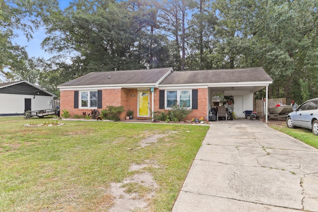 7696 Brandywine Rd, North Charleston, SC 29420 - view of front of home featuring brick siding, concrete driveway, and a carport
