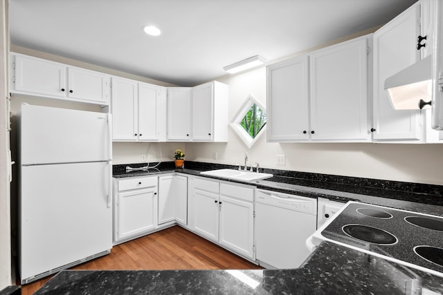 22 Ogier St, Charleston, SC 29403 - kitchen featuring white appliances, white cabinets, light wood-style flooring, and recessed lighting