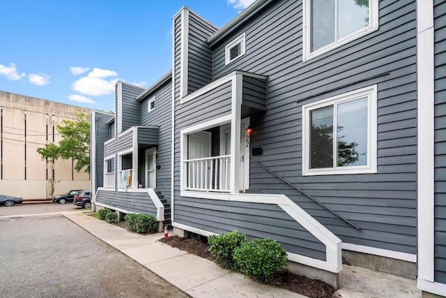 22 Ogier St, Charleston, SC 29403 - view of home's exterior with a chimney