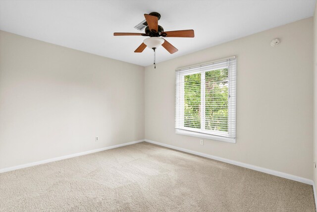 22 Ogier St, Charleston, SC 29403 - carpeted empty room with baseboards and ceiling fan